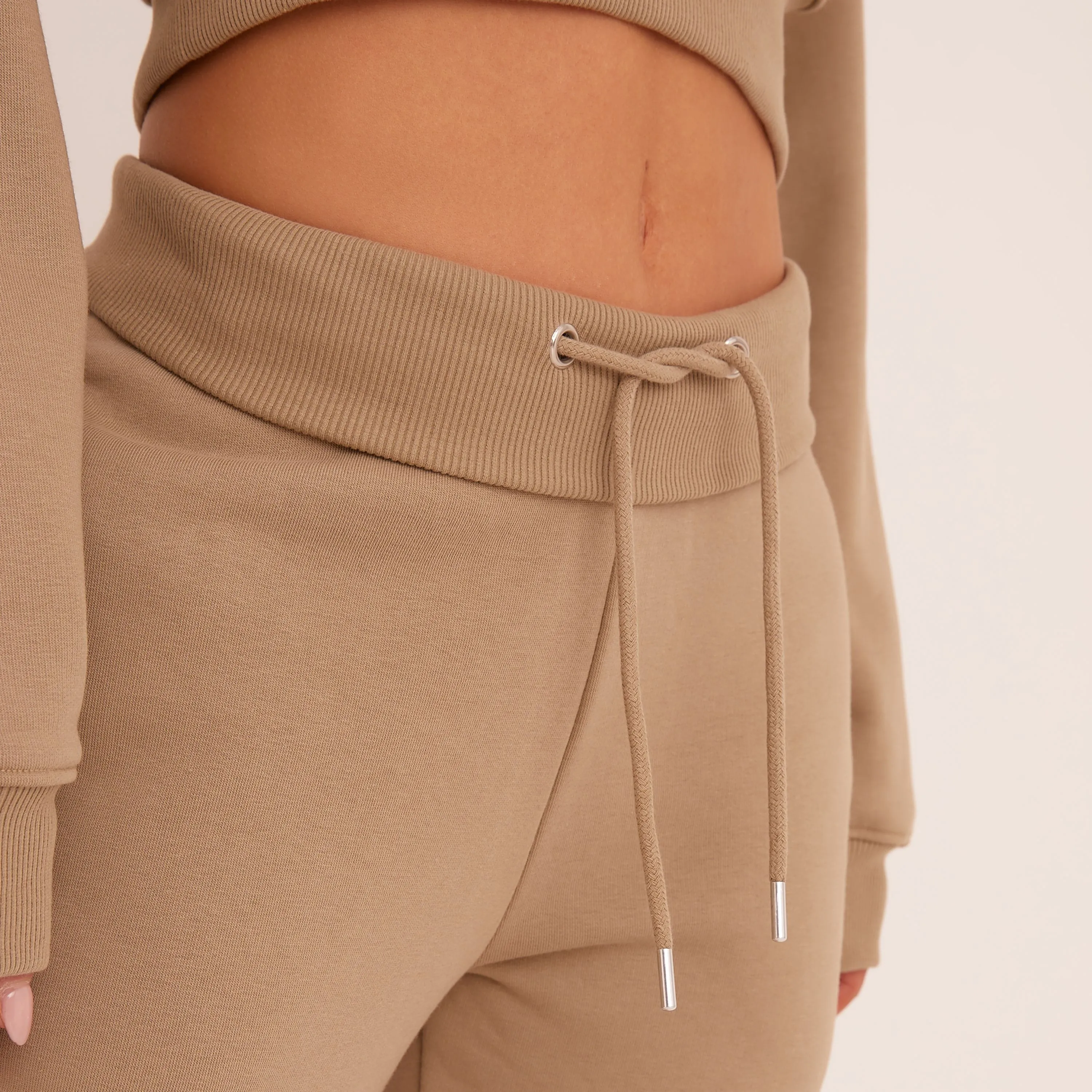 Low Rise Tie Waist Flared Joggers In Taupe Brown