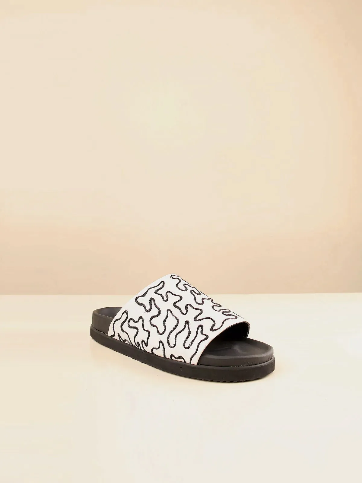 Maliko Feghale patterned slide shoes with Leather upper and leather lining