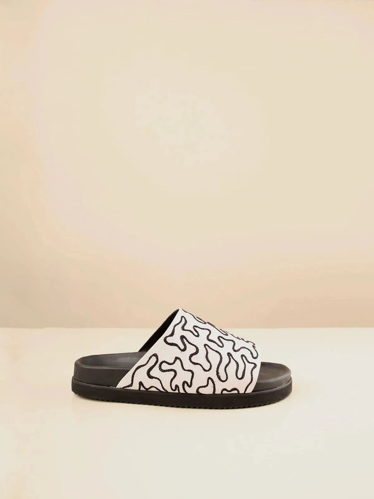 Maliko Feghale patterned slide shoes with Leather upper and leather lining