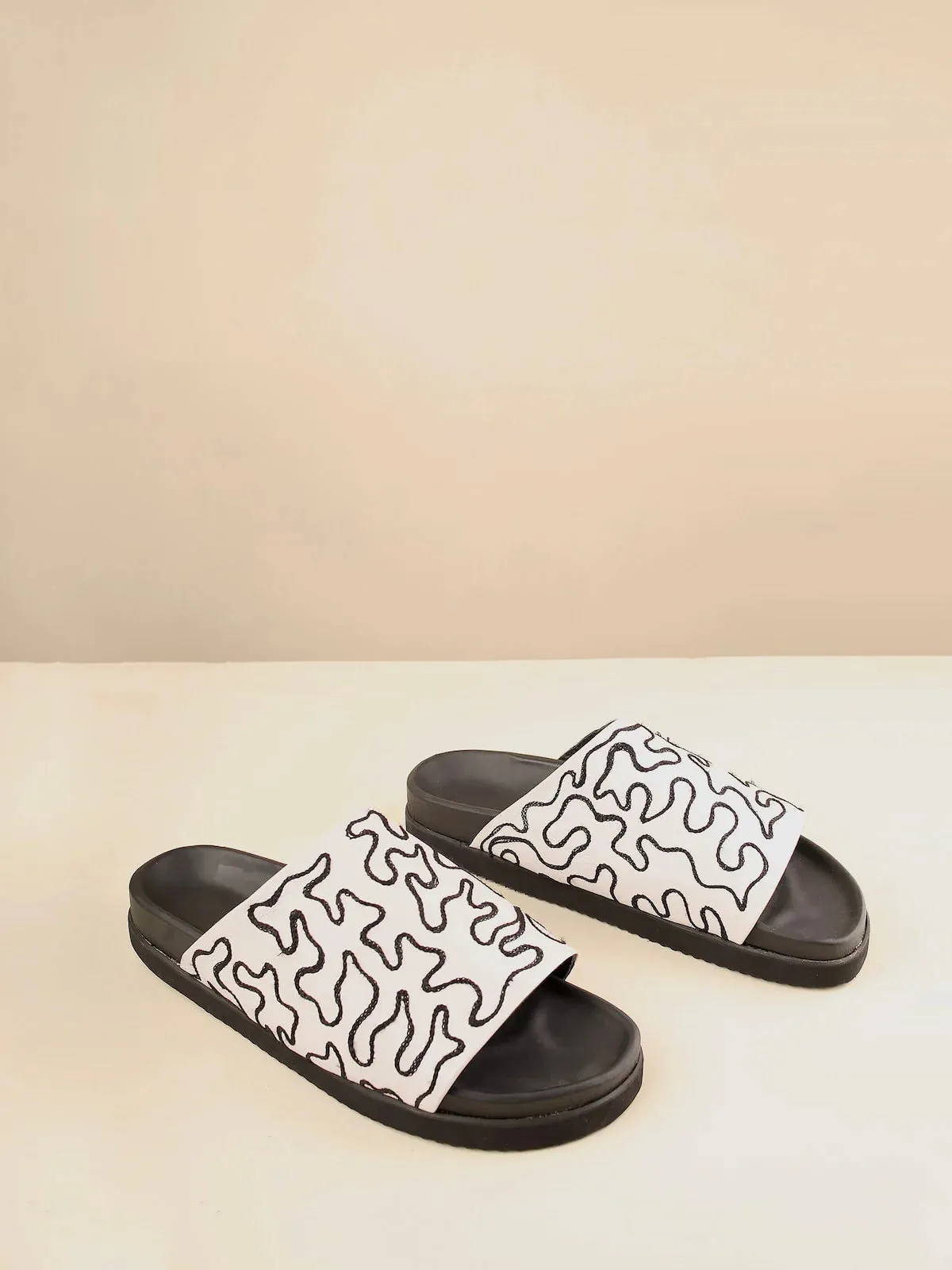 Maliko Feghale patterned slide shoes with Leather upper and leather lining